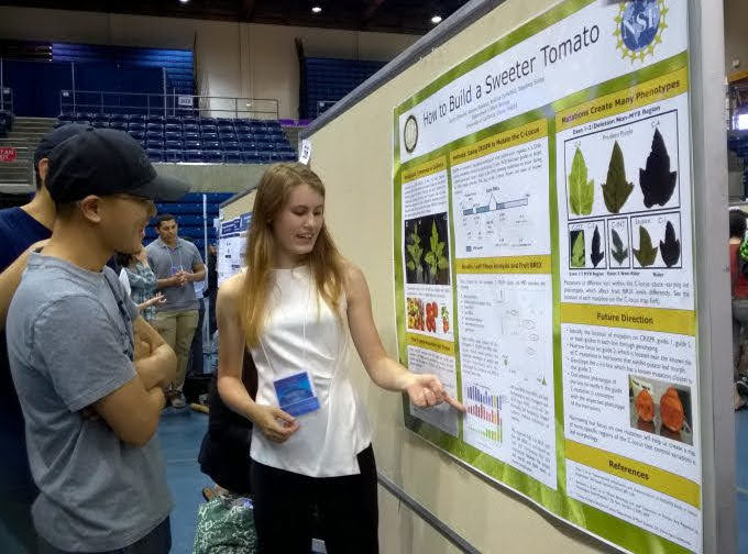 baby Lauren presenting her undergraduate research poster at UC Davis' Undergraduate Research Symposium